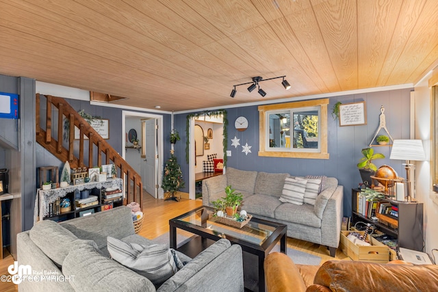 living room featuring hardwood / wood-style floors, wooden ceiling, and wood walls