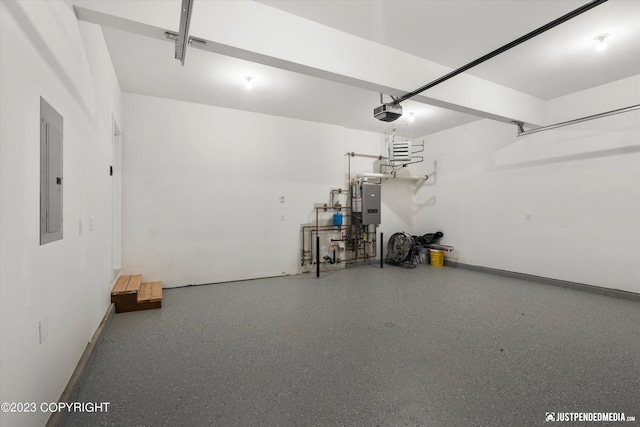 garage featuring electric panel and a garage door opener