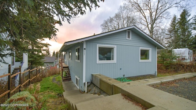 view of property exterior at dusk