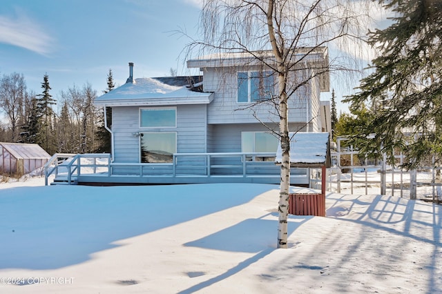 view of front of property with a deck