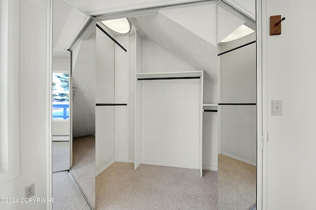 2795 Watergate Way, Kenai, AK 99611 - walk in closet featuring lofted ceiling and a baseboard radiator