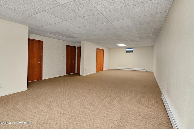 basement with carpet flooring and a baseboard radiator