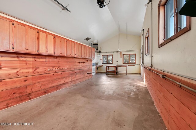 2795 Watergate Way, Kenai, AK 99611 - corridor with lofted ceiling and concrete flooring