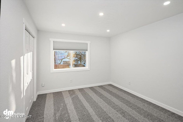 unfurnished room featuring carpet floors