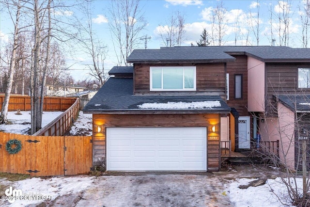 view of front of home with a garage