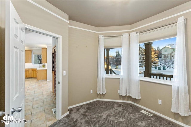 empty room featuring tile patterned flooring