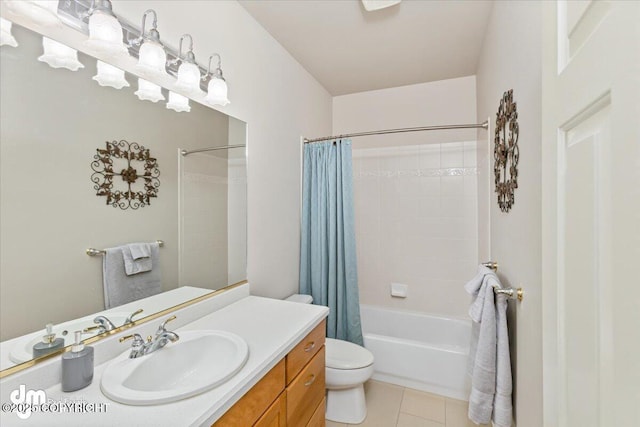 full bathroom with tile patterned floors, shower / bathtub combination with curtain, vanity, and toilet