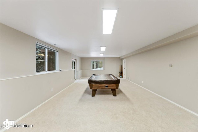 playroom with light carpet and billiards