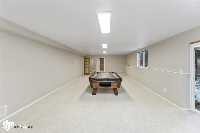 rec room with light carpet, billiards, and french doors