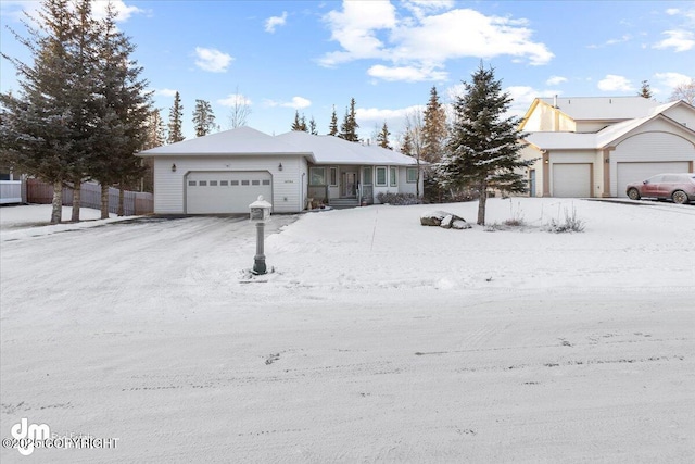 ranch-style house featuring a garage