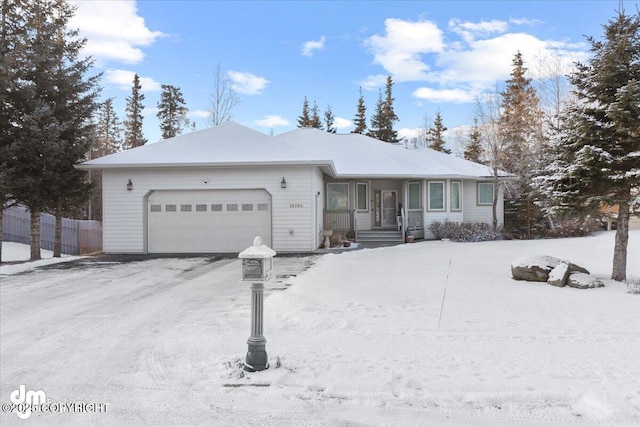 single story home featuring a garage