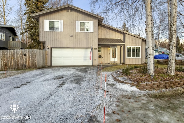 view of front of property with a garage