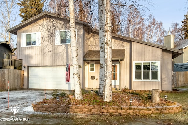 view of front of house with a garage