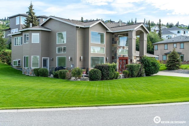16643 Woods Pointe Cir, Anchorage, AK 99516 - view of front of property with a front lawn