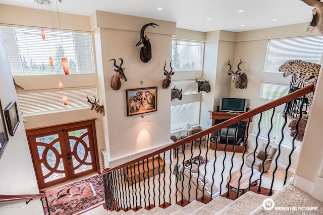 16643 Woods Pointe Cir, Anchorage, AK 99516 - staircase with baseboards and recessed lighting