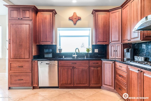 16643 Woods Pointe Cir, Anchorage, AK 99516 - kitchen with stainless steel appliances, ventilation hood, backsplash, recessed lighting, and dark stone counters