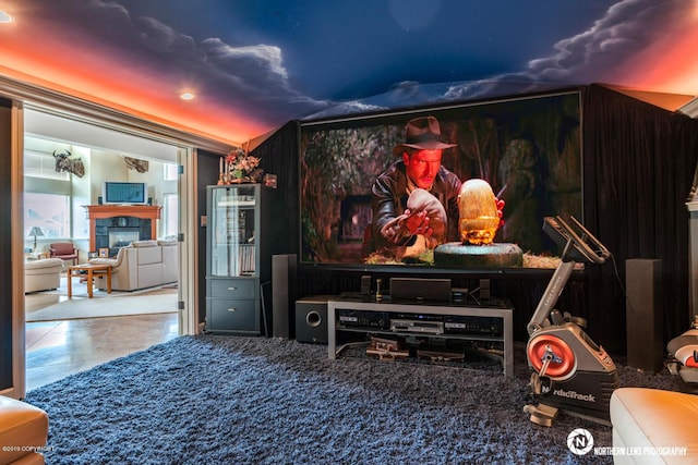 16643 Woods Pointe Cir, Anchorage, AK 99516 - home theater room with a tiled fireplace and recessed lighting