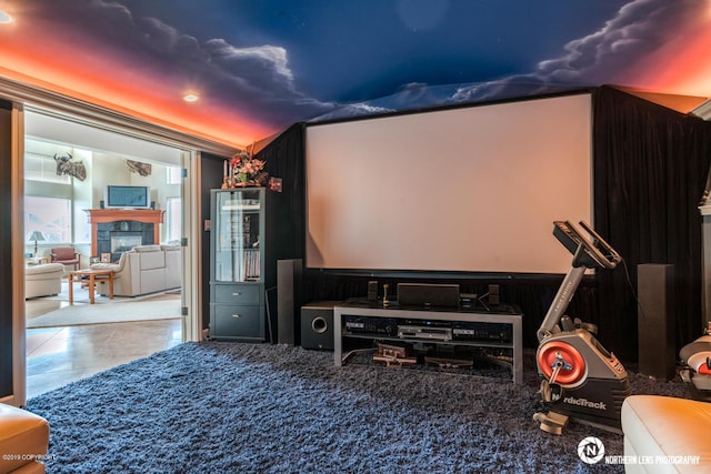 16643 Woods Pointe Cir, Anchorage, AK 99516 - cinema with a tiled fireplace and recessed lighting