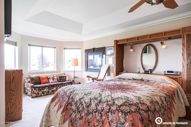 16643 Woods Pointe Cir, Anchorage, AK 99516 - carpeted bedroom featuring a raised ceiling, ornamental molding, and ceiling fan