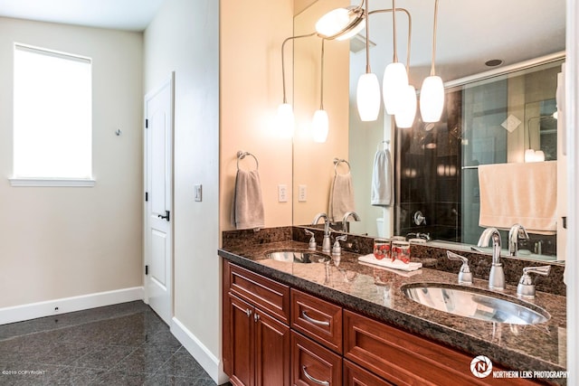 16643 Woods Pointe Cir, Anchorage, AK 99516 - bathroom with granite floors, double vanity, and tiled shower