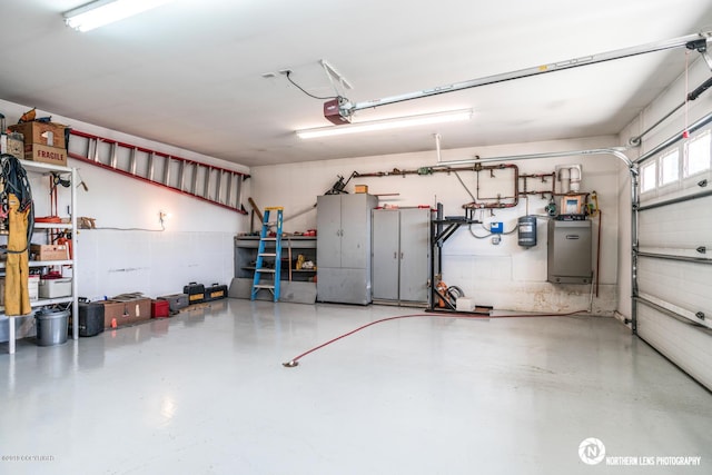 16643 Woods Pointe Cir, Anchorage, AK 99516 - garage featuring a garage door opener