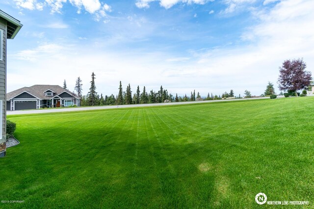 16643 Woods Pointe Cir, Anchorage, AK 99516 - view of green lawn