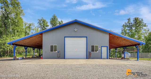 garage featuring a carport