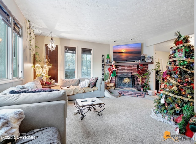 carpeted living room with a textured ceiling, a brick fireplace, and a healthy amount of sunlight