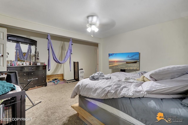 bedroom with ceiling fan and carpet floors