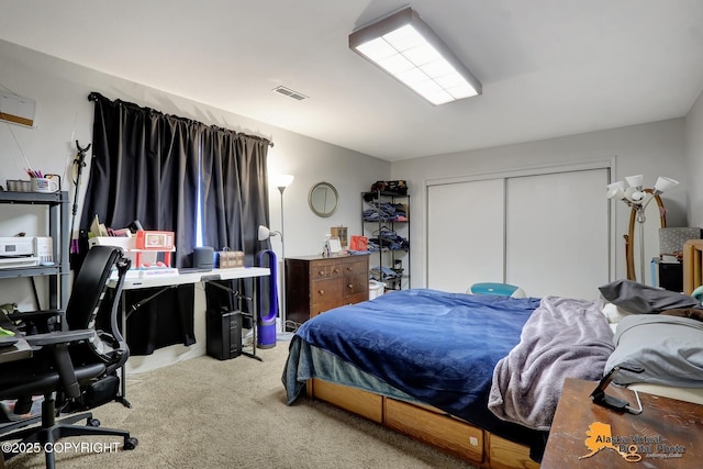 carpeted bedroom with a closet