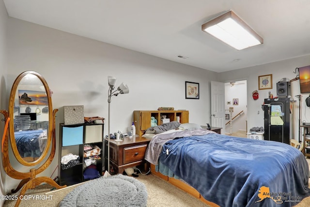 bedroom featuring carpet