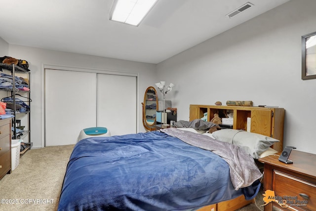 carpeted bedroom with a closet