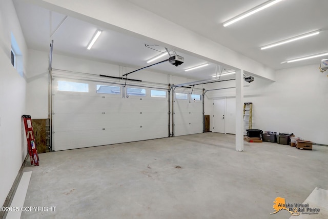 8803 Chalk Hill Loop, Anchorage, AK 99502 - garage featuring a garage door opener