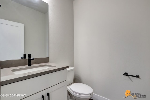 8803 Chalk Hill Loop, Anchorage, AK 99502 - half bath with vanity and toilet