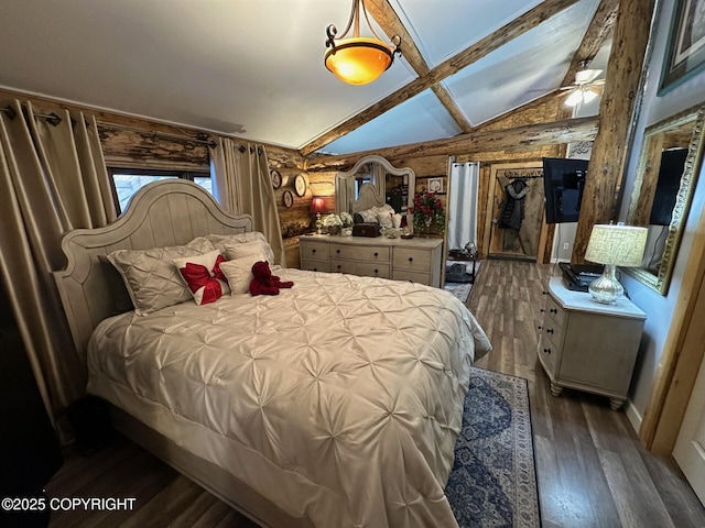 bedroom featuring rustic walls, dark hardwood / wood-style flooring, and lofted ceiling