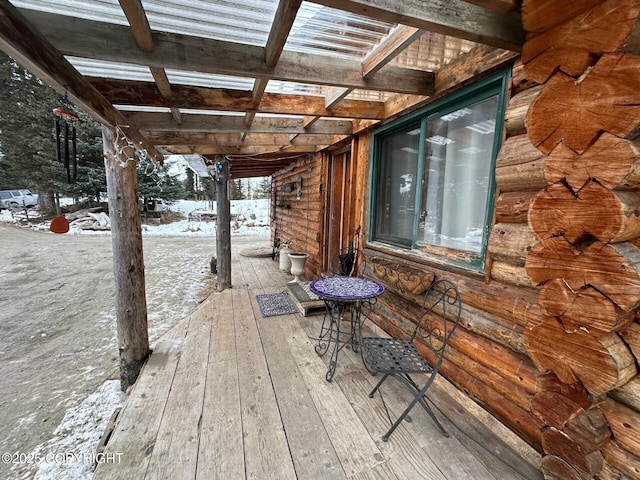 view of snow covered deck