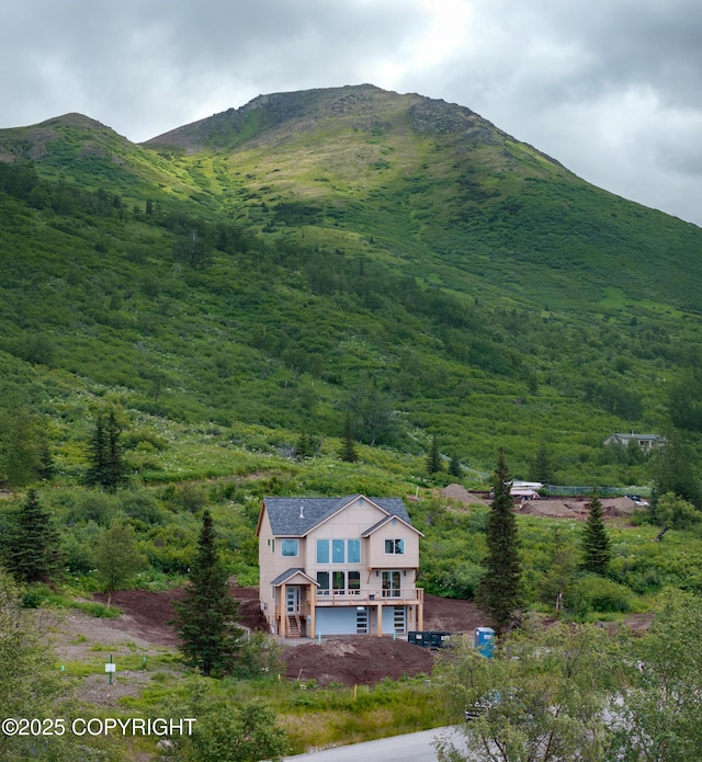 13851 Canyon Rd, Anchorage, AK 99516 - view of mountain backdrop featuring a heavily wooded area