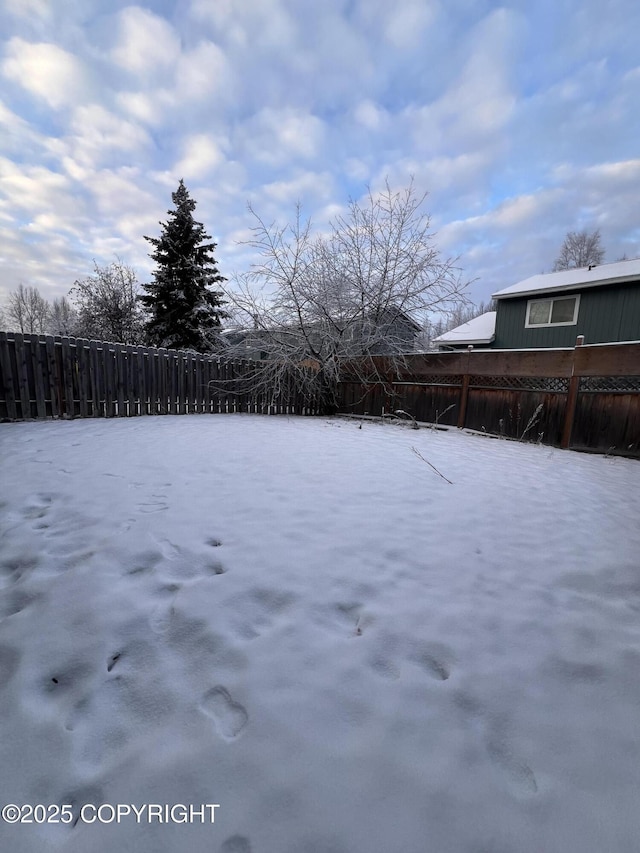 view of snowy yard