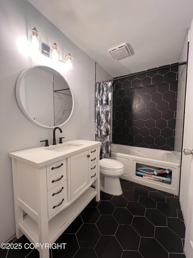 full bathroom with toilet, tile patterned flooring, vanity, and shower / bath combination with curtain