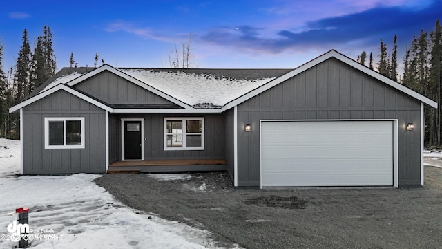 ranch-style home with a garage