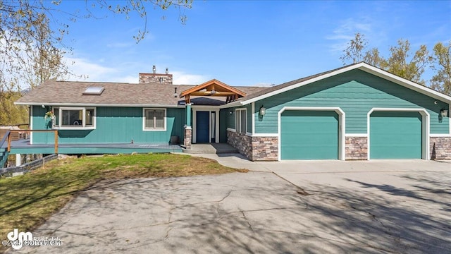 view of front of property featuring a garage