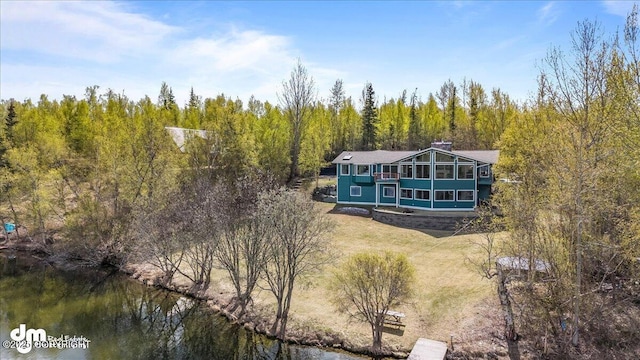 drone / aerial view with a water view