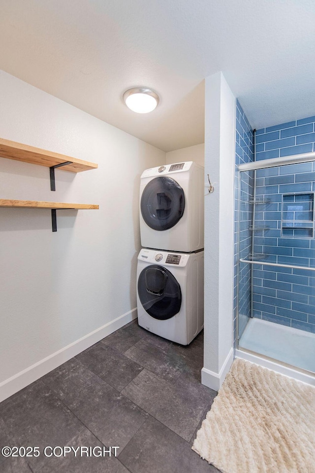 laundry room with stacked washing maching and dryer