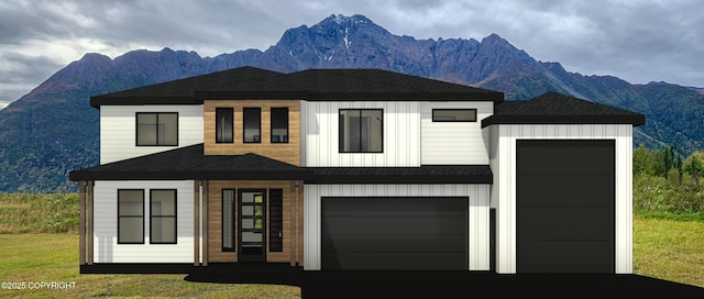 view of front of property featuring driveway, a shingled roof, and a mountain view