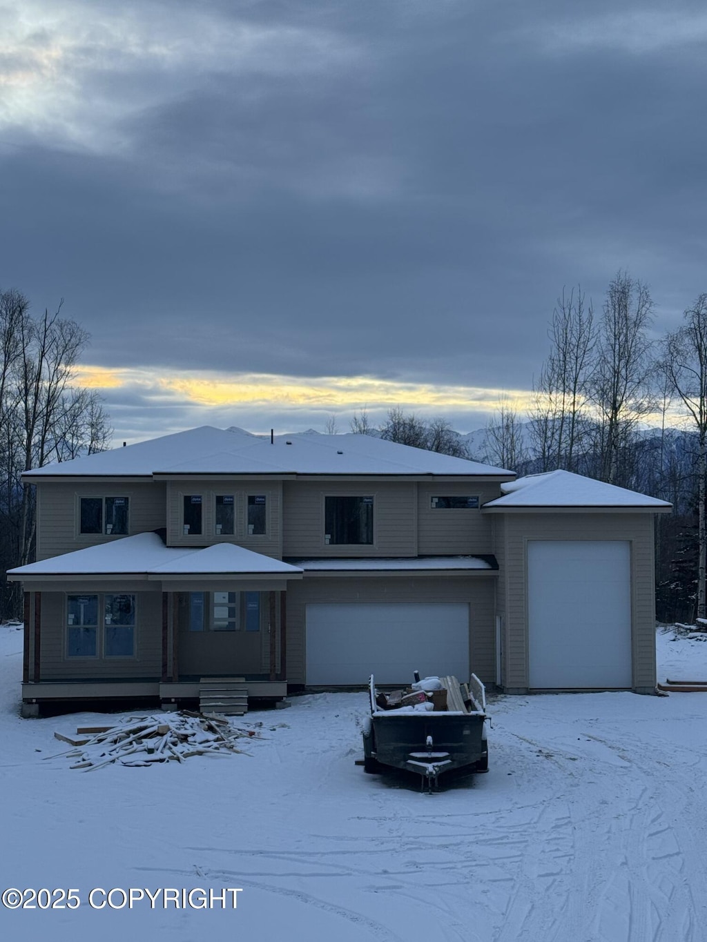 view of front of property featuring a garage