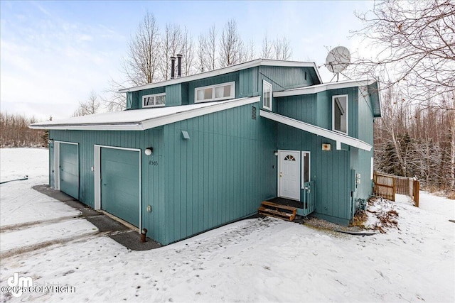 exterior space with a garage