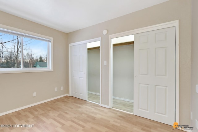 unfurnished bedroom featuring light hardwood / wood-style flooring