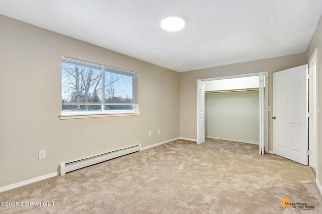 unfurnished bedroom with a closet, light colored carpet, and a baseboard radiator