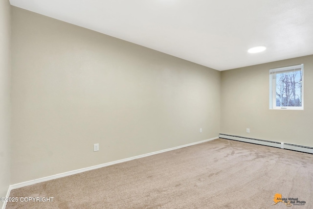 unfurnished room featuring carpet floors and a baseboard radiator