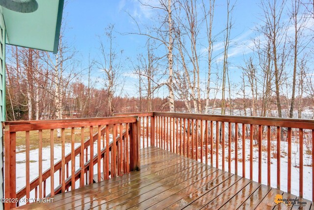 view of snow covered deck